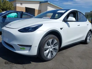 2023 Tesla Model Y Long Range with VIN 7SAYGDEE2PF632121, listed as a IAAI auction lot 41798780 with 53,773 mi miles. Bid and sale history available at carsss.com. Image 2.