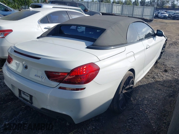 2018 BMW 6 Series 640i with VIN WBA6F1C5XJGT83781, listed as a IAAI auction lot 41945616 with 46,370 mi miles and . Bid and sale history available at carsss.com. Image 4.