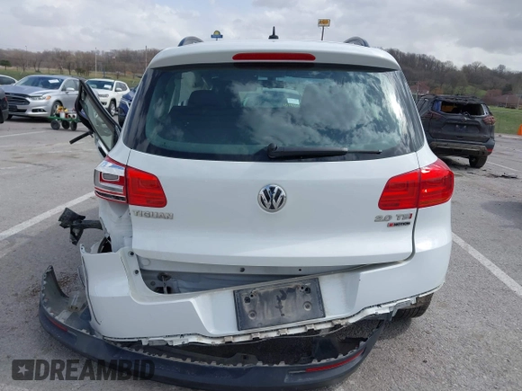 2016 Volkswagen Tiguan S with VIN WVGBV7AX5GW600479, listed as a IAAI auction lot 41828028 with 131,910 mi miles and . Bid and sale history available at DreamBid. Image 17.