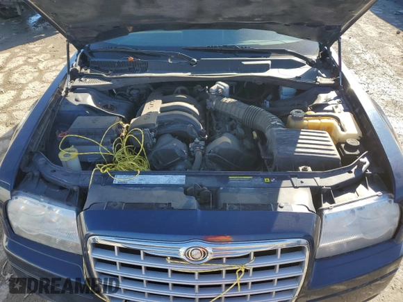 2005 Chrysler 300 300 z VIN 2C3JA43R15H636551, wystawiony jako Copart lot #42165655 z przebiegiem Nie podano mil oraz Nie do naprawy • Non repairable. Historia ofert i sprzedaży dostępna na DreamBid. Obrazek 11.