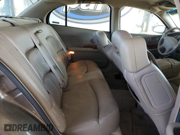2000 Buick LeSabre Limited z VIN 1G4HR54KXYU139070, wystawiony jako Copart lot #61306035 z przebiegiem 183 354 mil mil oraz Czysty tytuł • Clean title. Historia ofert i sprzedaży dostępna na DreamBid. Obrazek 10.