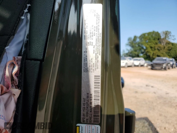 2023 Jeep Gladiator Willys z VIN 1C6HJTAG5PL574414, wystawiony jako Copart lot #70590424 z przebiegiem 11 681 mil mil oraz Szkoda całkowita • Salvage title. Historia ofert i sprzedaży dostępna na DreamBid. Obrazek 14.