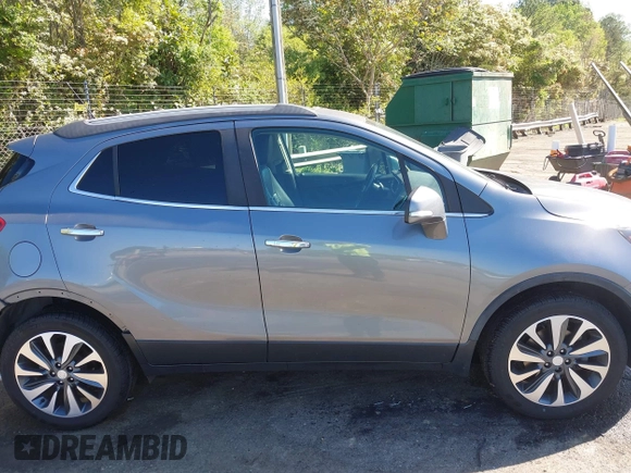 2019 Buick Encore Essence with VIN KL4CJGSM5KB869925, listed as a IAAI auction lot 41937487 with 105,702 mi miles. Bid and sale history available at carsss.com. Image 14.