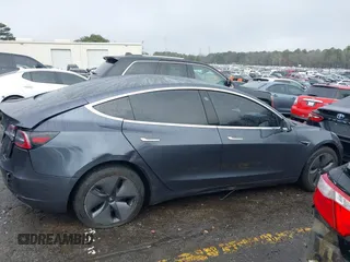 2019 Tesla Model 3 Mid Range with VIN 5YJ3E1EA3KF426971, listed as a IAAI auction lot 41564939 with Not Provided miles and . Bid and sale history available at carsss.com. Image 13.
