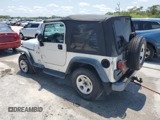2004 Jeep Wrangler X with VIN 1J4FA39S74P763492, listed as a Copart auction lot 54664095 with 168,493 mi miles and Salvage Title. Bid and sale history available at DreamBid. Image 2.