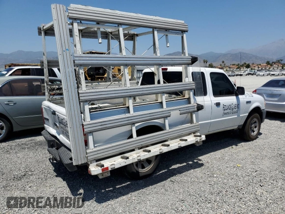 2011 Ford Ranger XL with VIN 1FTKR1EEXBPA10991, listed as a Copart auction lot 58537064 with 102,897 mi miles and Salvage Title. Bid and sale history available at carsss.com. Image 3.