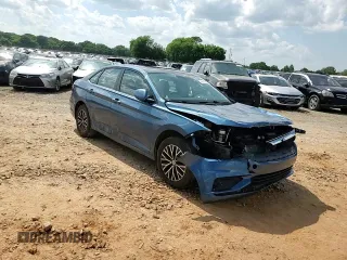 2021 Volkswagen Jetta S z VIN 3VWC57BUXMM001907, wystawiony jako Copart lot #54909405 z przebiegiem 130 101 mil mil oraz Szkoda całkowita • Salvage title. Historia ofert i sprzedaży dostępna na DreamBid. Obrazek 13.