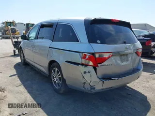 2011 Honda Odyssey EX-L with VIN 5FNRL5H62BB075789, listed as a IAAI auction lot 42035746 with 238,616 mi miles and . Bid and sale history available at carsss.com. Image 3.