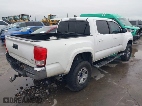 2017 Toyota Tacoma SR5 with VIN 5TFAZ5CN2HX034555, listed as a IAAI auction lot 41890292 with 133,465 mi miles and . Bid and sale history available at DreamBid. Image 4.