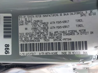 2022 Toyota Tacoma SR5 z VIN 3TMBZ5DN3NM034388, wystawiony jako IAAI lot #42270543 z przebiegiem 179 904 mil mil oraz . Historia ofert i sprzedaży dostępna na DreamBid. Obrazek 9.