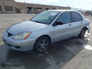 2004 Mitsubishi Lancer ES with VIN JA3AJ26E54U052124, listed as a IAAI auction lot 41804473 with 165,786 mi miles. Bid and sale history available at carsss.com. Image 20.