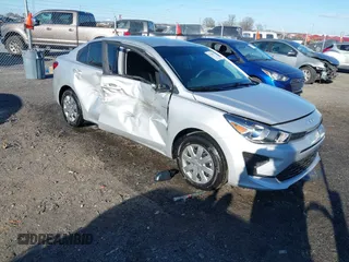 2023 Kia Rio LX with VIN 3KPA24ADXPE606463, listed as a IAAI auction lot 41728523 with 8,909 mi miles and . Bid and sale history available at DreamBid. Image 1.