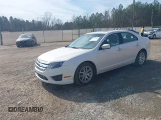 2012 Ford Fusion SEL z VIN 3FAHP0JAXCR412569, wystawiony jako IAAI lot #41420304 z przebiegiem 174 369 mil mil oraz . Historia ofert i sprzedaży dostępna na DreamBid. Obrazek 2.