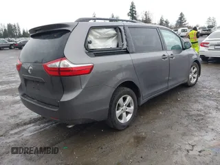 2015 Toyota Sienna LE AAS with VIN 5TDKK3DC3FS635681, listed as a IAAI auction lot 41988400 with 122,669 mi miles and . Bid and sale history available at DreamBid. Image 4.