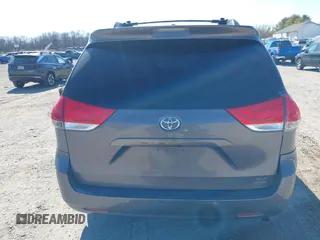 2012 Toyota Sienna XLE with VIN 5TDDK3DC5CS047530, listed as a IAAI auction lot 41780049 with 209,812 mi miles. Bid and sale history available at carsss.com. Image 17.
