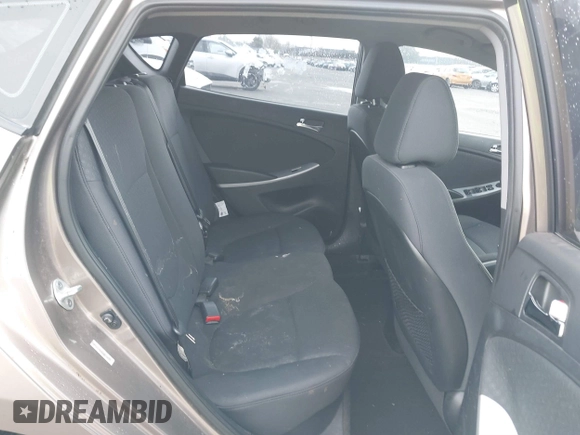 2013 Hyundai Accent SE z VIN KMHCU5AE1DU079830, wystawiony jako IAAI lot #41529695 z przebiegiem 105 637 mil mil oraz . Historia ofert i sprzedaży dostępna na DreamBid. Obrazek 8.