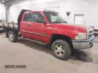 1999 Dodge Ram 2500 with VIN 1B7KF23W2XJ617522, listed as a IAAI auction lot 41442384 with 106,649 mi miles. Bid and sale history available at carsss.com. Image 1.