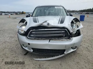 2016 MINI Countryman with VIN WMWZB3C50GWR48610, listed as a Copart auction lot 44028035 with 69,801 mi miles and Salvage title. Bid and sale history available at DreamBid. Image 5.