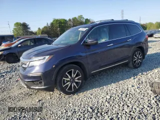 2022 Honda Pilot Touring 7-Passenger z VIN 5FNYF5H64NB017528, wystawiony jako Copart lot #53305405 z przebiegiem 64 651 mil mil oraz Szkoda całkowita • Salvage title. Historia ofert i sprzedaży dostępna na DreamBid. Obrazek 1.