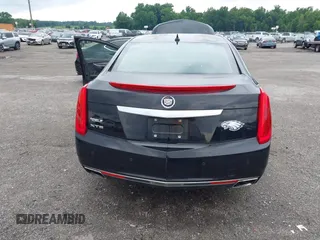 2013 Cadillac XTS Luxury z VIN 2G61P5S34D9183065, wystawiony jako IAAI lot #42665741 z przebiegiem 209 585 mil mil oraz . Historia ofert i sprzedaży dostępna na DreamBid. Obrazek 17.