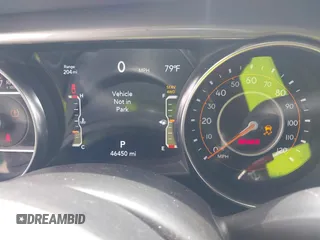 2021 Jeep Gladiator High Altitude z VIN 1C6HJTFG1ML597807, wystawiony jako IAAI lot #42336812 z przebiegiem 46 450 mil mil oraz . Historia ofert i sprzedaży dostępna na DreamBid. Obrazek 7.