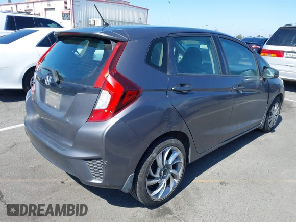 2015 Honda Fit LX with VIN 3HGGK5G54FM731965, listed as a IAAI auction lot 42655355 with 141,205 mi miles and . Bid and sale history available at DreamBid. Image 4.