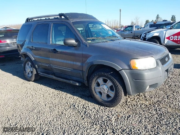 2003 Ford Escape XLT Popular 2 with VIN 1FMCU93143KB10936, listed as a IAAI auction lot 41414430 with 170,050 mi miles. Bid and sale history available at carsss.com. Image 1.