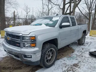 2015 Chevrolet Silverado 1500 LT with VIN 1GCVKREC0FZ252519, listed as a IAAI auction lot 41617697 with 97,737 mi miles. Bid and sale history available at carsss.com. Image 2.