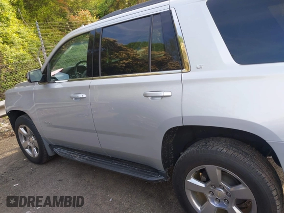 2019 Chevrolet Tahoe LT with VIN 1GNSCBKCXKR219413, listed as a IAAI auction lot 42013260 with 92,886 mi miles and . Bid and sale history available at DreamBid. Image 15.