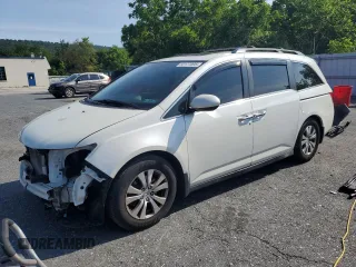 2014 Honda Odyssey EX-L with VIN 5FNRL5H6XEB086818, listed as a Copart auction lot 62177095 with 148,917 mi miles and Salvage title. Bid and sale history available at DreamBid. Image 1.