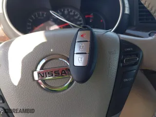 2014 Nissan Quest S with VIN JN8AE2KP5E9102333, listed as a IAAI auction lot 41256031 with 165,640 mi miles. Bid and sale history available at carsss.com. Image 11.