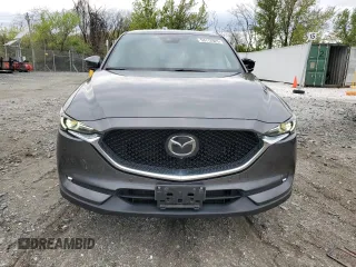 2019 Mazda CX-5 Signature with VIN JM3KFBEY3K0521581, listed as a Copart auction lot 53112925 with 62,977 mi miles and Salvage Title. Bid and sale history available at carsss.com. Image 5.