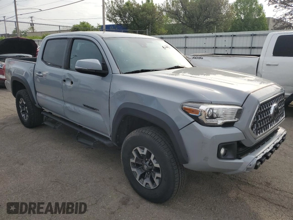 2019 Toyota Tacoma SR z VIN 3TMCZ5AN0KM227229, wystawiony jako Copart lot #54984895 z przebiegiem 244 400 mil mil oraz Czysty tytuł • Clean title. Historia ofert i sprzedaży dostępna na DreamBid. Obrazek 4.