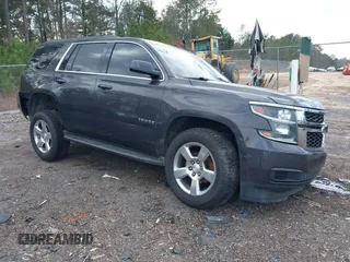 2017 Chevrolet Tahoe LT z VIN 1GNSKBKC8HR136641, wystawiony jako IAAI lot #41506437 z przebiegiem 183 548 mil mil oraz . Historia ofert i sprzedaży dostępna na DreamBid. Obrazek 1.