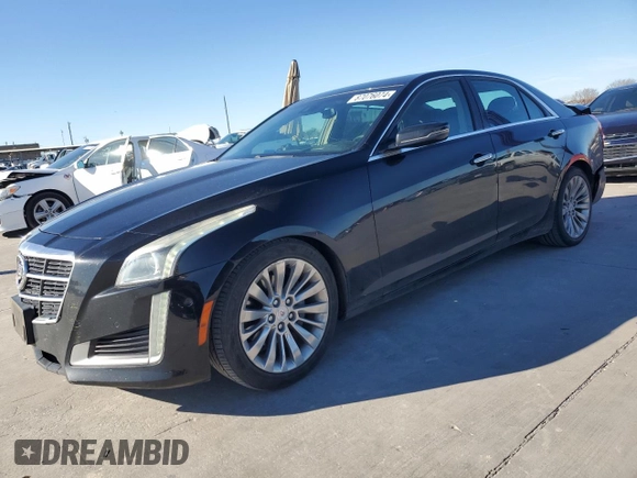 2014 Cadillac CTS Performance RWD with VIN 1G6AS5SX7E0184479, listed as a Copart auction lot 87076074 with 121,927 mi miles and Clean title. Bid and sale history available at DreamBid. Image 1.