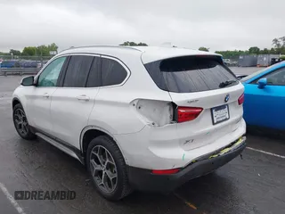 2019 BMW X1 xDrive28i with VIN WBXHT3C54K3H35641, listed as a IAAI auction lot 42241894 with 100,989 mi miles and . Bid and sale history available at DreamBid. Image 14.