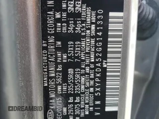 2016 Kia Sorento SX z VIN 5XYPKDA52GG141330, wystawiony jako Copart lot #55448425 z przebiegiem 78 330 mil mil oraz Szkoda całkowita • Salvage title. Historia ofert i sprzedaży dostępna na DreamBid. Obrazek 13.