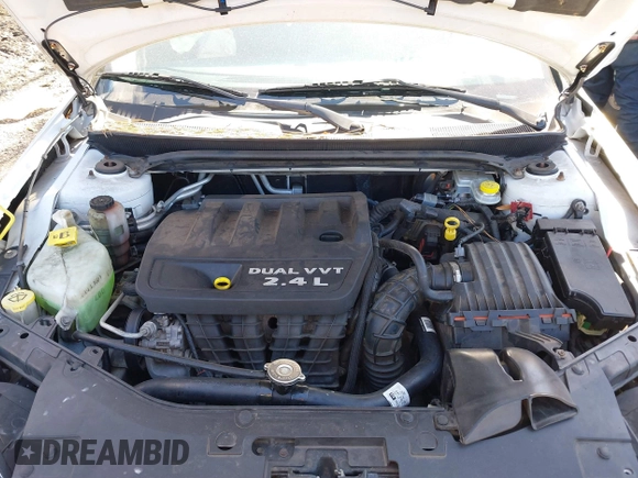2014 Chrysler 200 LX with VIN 1C3CCBAB2EN208735, listed as a IAAI auction lot 41623000 with 104,819 mi miles and . Bid and sale history available at carsss.com. Image 10.