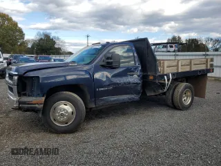 2009 Chevrolet Silverado 3500HD WT with VIN 1GBJC74K99E137457, listed as a Copart auction lot 81621334 with 75,018 mi miles and Salvage Title. Bid and sale history available at DreamBid. Image 1.