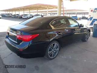 2014 Infiniti Q50 Premium with VIN JN1BV7AP9EM688811, listed as a IAAI auction lot 41483058 with 95,204 mi miles and . Bid and sale history available at DreamBid. Image 4.