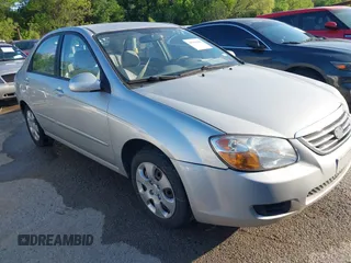 2009 Kia Spectra EX with VIN KNAFE221795620189, listed as a IAAI auction lot 41946984 with 131,913 mi miles. Bid and sale history available at carsss.com. Image 1.