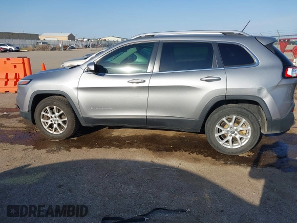 2016 Jeep Cherokee Latitude with VIN 1C4PJMCB5GW218166, listed as a IAAI auction lot 40458497 with 145,272 mi miles and . Bid and sale history available at carsss.com. Image 14.