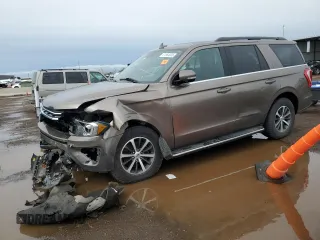 2018 Ford Expedition XLT with VIN 1FMJU1JT5JEA13771, listed as a Copart auction lot 61564935 with 181,116 mi miles and Salvage title. Bid and sale history available at DreamBid. Image 1.