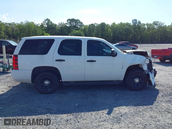 2011 Chevrolet Tahoe Commercial with VIN 1GNLC2E04BR293125, listed as a IAAI auction lot 42476037 with 123,666 mi miles and . Bid and sale history available at DreamBid. Image 13.