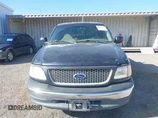 1999 Ford F-150 XL with VIN 1FTRX17L5XKB39130, listed as a IAAI auction lot 42041520 with Not Provided miles. Bid and sale history available at carsss.com. Image 6.