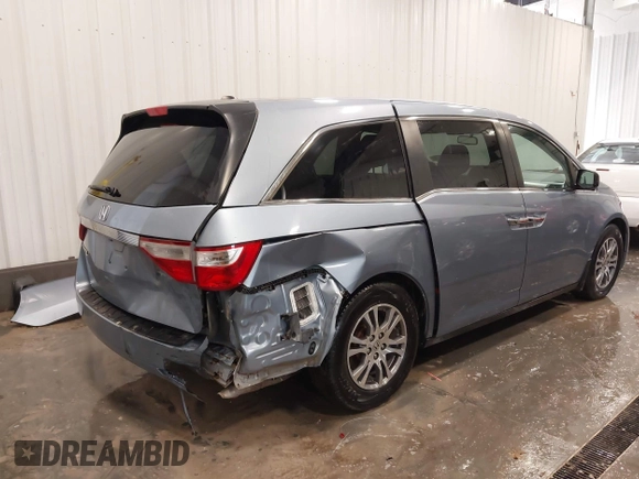 2013 Honda Odyssey EX-L with VIN 5FNRL5H67DB015512, listed as a IAAI auction lot 41758695 with 193,356 mi miles and . Bid and sale history available at carsss.com. Image 6.
