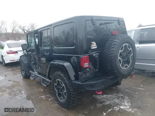 2015 Jeep Wrangler Unlimited Rubicon Hard Rock with VIN 1C4HJWFG9FL569962, listed as a IAAI auction lot 41557801 with 78,597 mi miles. Bid and sale history available at carsss.com. Image 3.