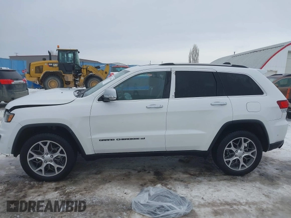 2022 Jeep Grand Cherokee Limited with VIN 1C4RJFBG5NC123297, listed as a IAAI auction lot 41509434 with 58,944 mi miles and . Bid and sale history available at DreamBid. Image 15.
