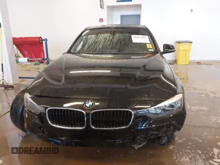 2015 BMW 3 Series 320i xDrive with VIN WBA3C3C56FK203031, listed as a IAAI auction lot 41012182 with 83,611 mi miles and . Bid and sale history available at DreamBid. Image 12.