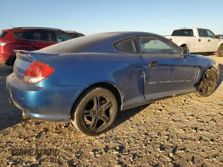 2005 Hyundai Tiburon GT z VIN KMHHN65F35U186438, wystawiony jako Copart lot #41879955 z przebiegiem 152 574 mil mil oraz Szkoda całkowita • Salvage title. Historia ofert i sprzedaży dostępna na DreamBid. Obrazek 3.
